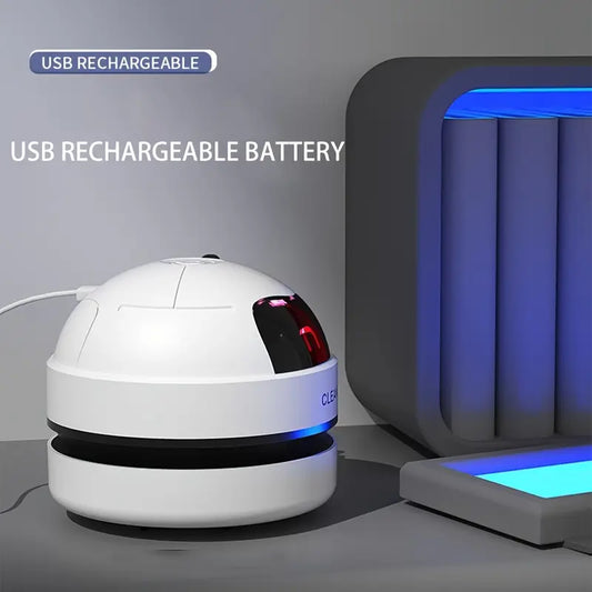 A Mini Desktop Vacuum Cleaner Portable Small USB Rechargeable Battery Powered Robot.